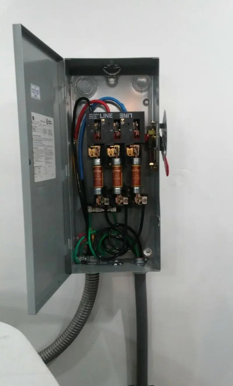 Three-phase disconnect switch installed for Smoke Detector Installation in Chisholm